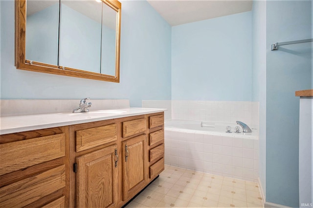 13920 Lexington Cir, Granger, IN 46530 - bathroom with vanity and a garden tub