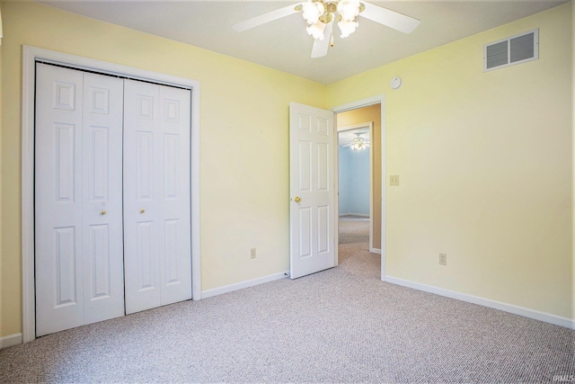 13920 Lexington Cir, Granger, IN 46530 - unfurnished bedroom with carpet floors, a closet, and a ceiling fan