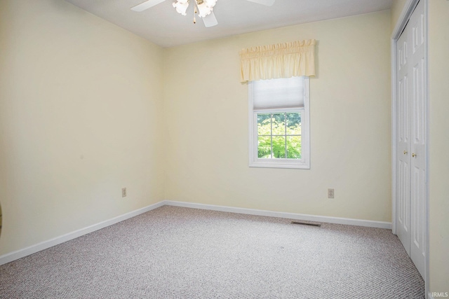13920 Lexington Cir, Granger, IN 46530 - unfurnished bedroom with a closet, carpet, and a ceiling fan