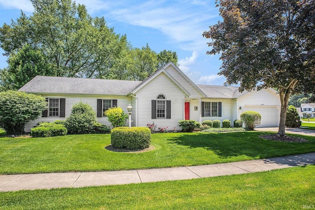 13920 Lexington Cir, Granger, IN 46530 - ranch-style house with an attached garage, a front lawn, and driveway