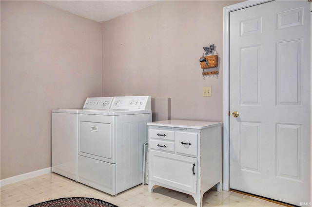 13920 Lexington Cir, Granger, IN 46530 - washroom with washing machine and dryer, light flooring, and cabinet space