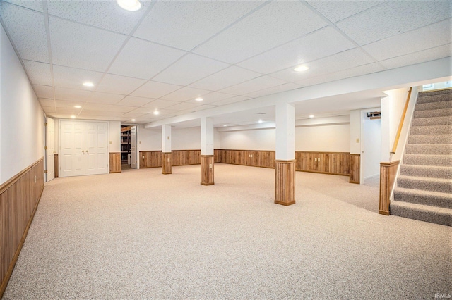 13920 Lexington Cir, Granger, IN 46530 - finished basement with a wainscoted wall, stairway, carpet flooring, wooden walls, and a drop ceiling