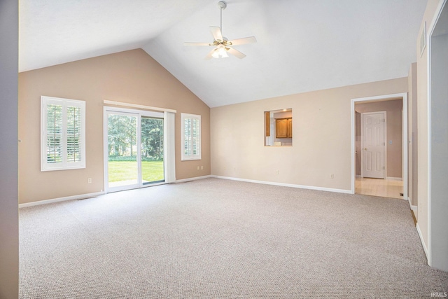 13920 Lexington Cir, Granger, IN 46530 - empty room featuring ceiling fan, light colored carpet, and high vaulted ceiling