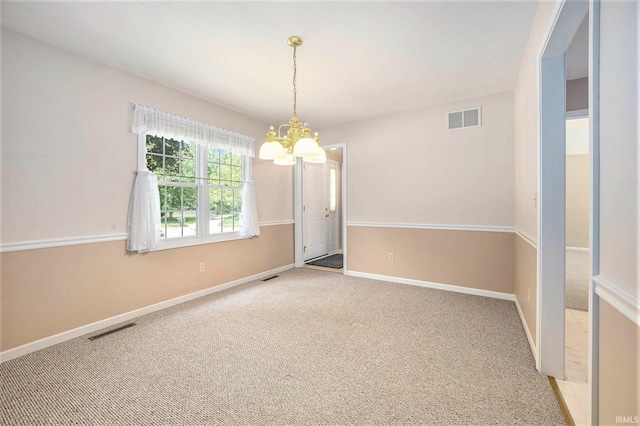 13920 Lexington Cir, Granger, IN 46530 - unfurnished room with a chandelier and light colored carpet