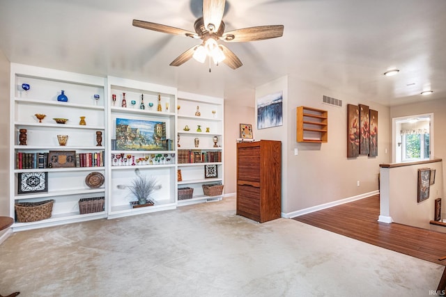 17991 Sable Ridge Dr, South Bend, IN 46635 - carpeted living area featuring baseboards and ceiling fan