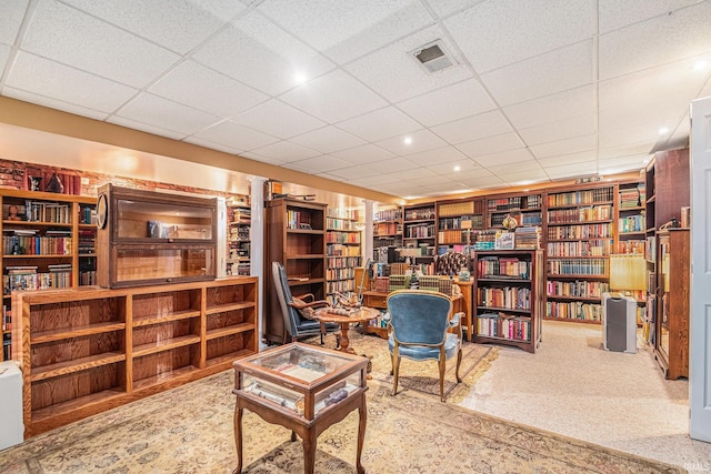 17991 Sable Ridge Dr, South Bend, IN 46635 - living area featuring wall of books and a drop ceiling