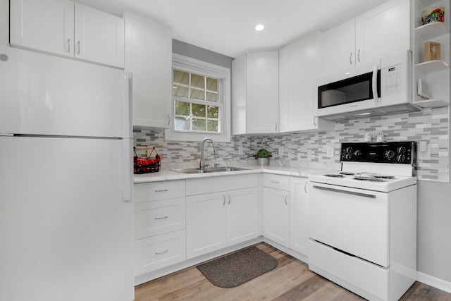 2405 E State Blvd, Fort Wayne, IN 46805 - kitchen featuring white appliances, open shelves, white cabinets, tasteful backsplash, and light wood-type flooring