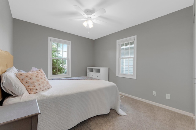 2405 E State Blvd, Fort Wayne, IN 46805 - bedroom featuring carpet flooring and a ceiling fan