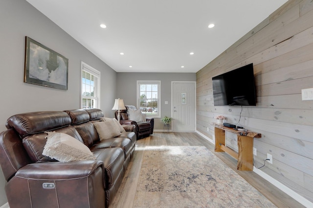 2405 E State Blvd, Fort Wayne, IN 46805 - living room featuring light wood-style flooring, wooden walls, and recessed lighting