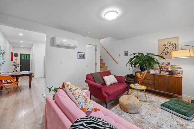 622 Romig St, Lafayette, IN 47901 - living room with an AC wall unit, stairs, light wood-style floors, and recessed lighting