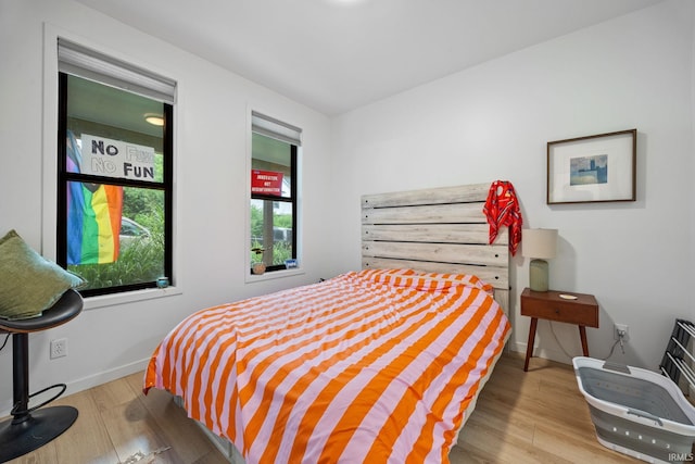 622 Romig St, Lafayette, IN 47901 - bedroom featuring wood finished floors and baseboards