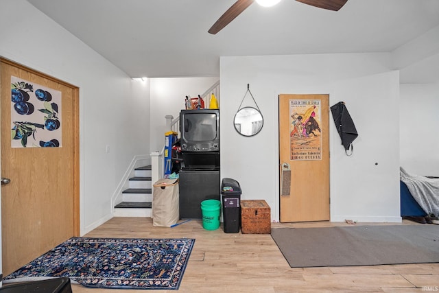 622 Romig St, Lafayette, IN 47901 - below grade area featuring wood finished floors, a ceiling fan, and stairway