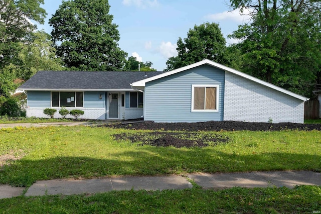 3524 Contessa Dr, Fort Wayne, IN 46816 - ranch-style home with a front lawn and brick siding