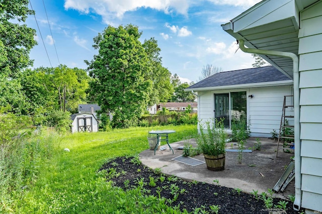 3524 Contessa Dr, Fort Wayne, IN 46816 - view of yard featuring a patio area and a storage shed