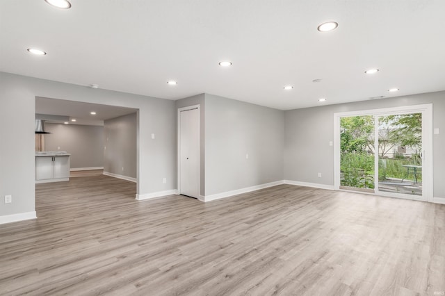 3524 Contessa Dr, Fort Wayne, IN 46816 - unfurnished living room with recessed lighting and light wood-style flooring