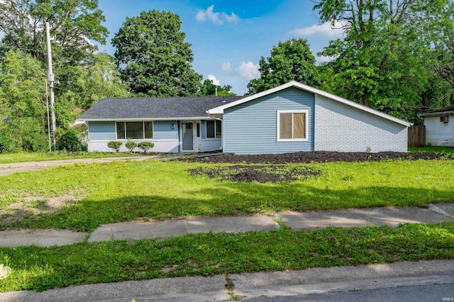 3524 Contessa Dr, Fort Wayne, IN 46816 - ranch-style home featuring a front lawn and brick siding
