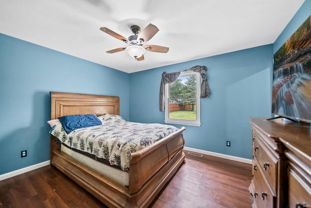 901 N Timberline Cir E, Warsaw, IN 46582 - bedroom featuring dark wood-style floors and a ceiling fan