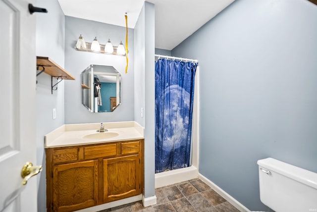 901 N Timberline Cir E, Warsaw, IN 46582 - full bath featuring vanity, curtained shower, and stone finish floors