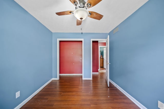 901 N Timberline Cir E, Warsaw, IN 46582 - unfurnished bedroom featuring wood finished floors and ceiling fan
