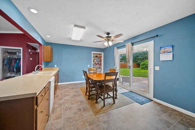 901 N Timberline Cir E, Warsaw, IN 46582 - dining area with baseboards and ceiling fan