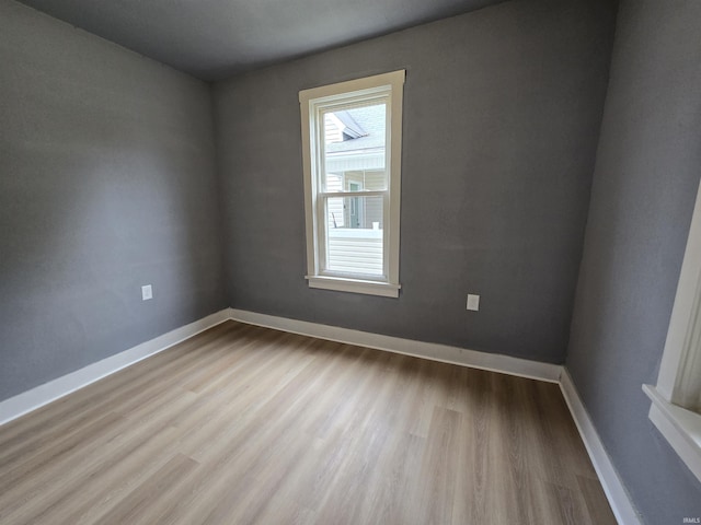 107 W S B St, Gas City, IN 46933 - empty room featuring wood finished floors and baseboards