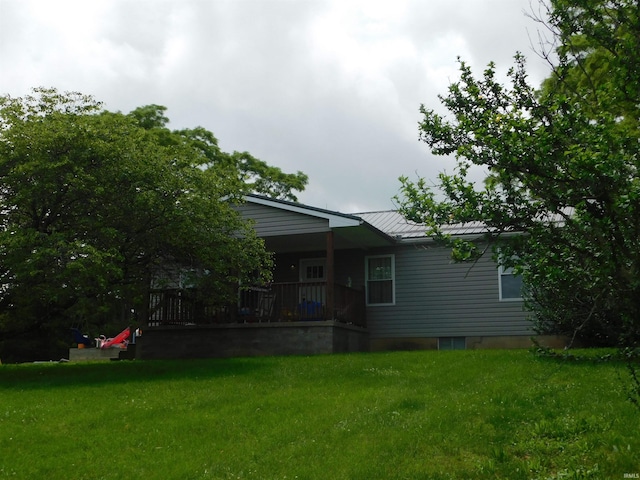 4597 S W Washington School Rd, Salem, IN 47167 - view of front of home with a front lawn, a standing seam roof, a porch, and a metal roof