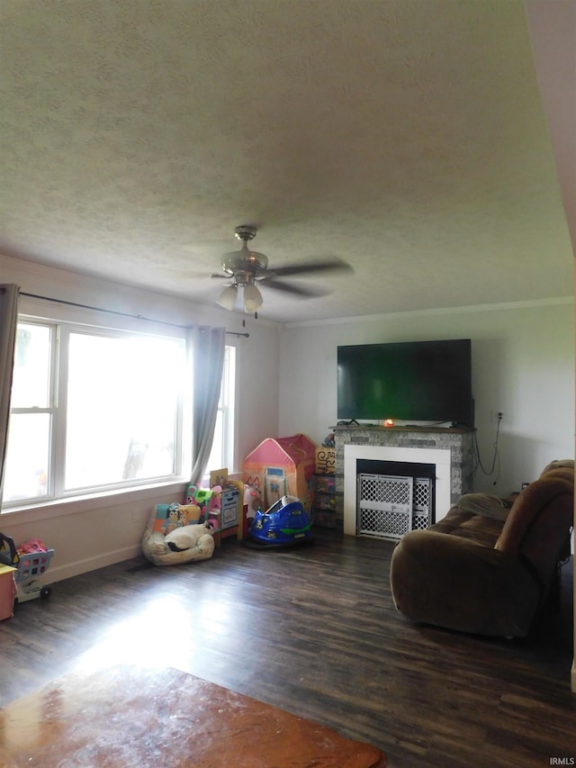 4597 S W Washington School Rd, Salem, IN 47167 - living area featuring wood finished floors, ceiling fan, ornamental molding, and a textured ceiling