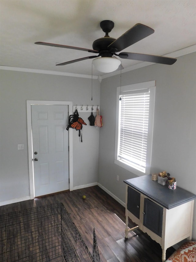 4597 S W Washington School Rd, Salem, IN 47167 - entrance foyer featuring dark wood finished floors, a ceiling fan, and crown molding