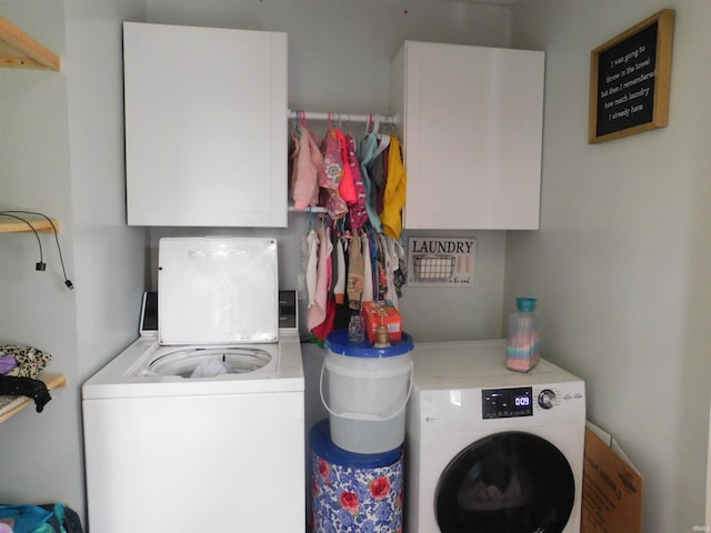 4597 S W Washington School Rd, Salem, IN 47167 - laundry room featuring cabinet space and washer and dryer