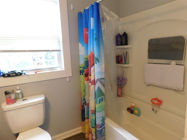 4597 S W Washington School Rd, Salem, IN 47167 - bathroom featuring shower / bathtub combination with curtain and toilet