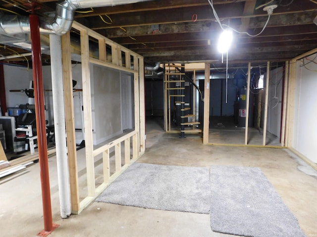 4597 S W Washington School Rd, Salem, IN 47167 - unfinished basement featuring water heater and stairs