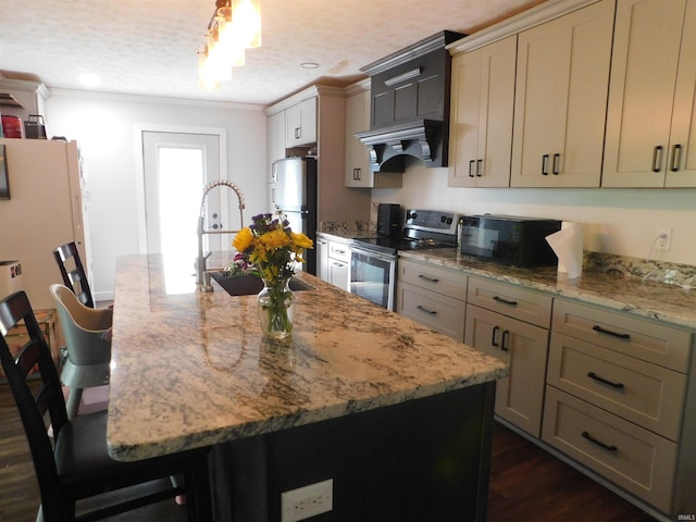4597 S W Washington School Rd, Salem, IN 47167 - kitchen with appliances with stainless steel finishes, a center island with sink, crown molding, a kitchen bar, and light stone counters