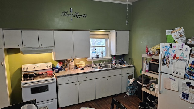 218 W Main St, Farmersburg, IN 47850 - kitchen with white appliances, under cabinet range hood, dark wood-style flooring, and white cabinetry