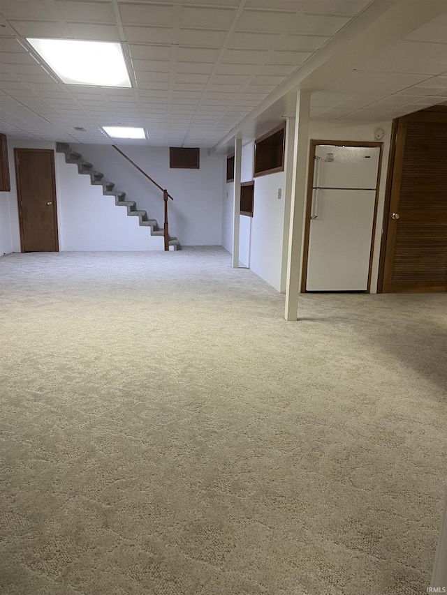 840 Giesler Rd, Jasper, IN 47546 - finished below grade area with freestanding refrigerator, carpet, and stairway
