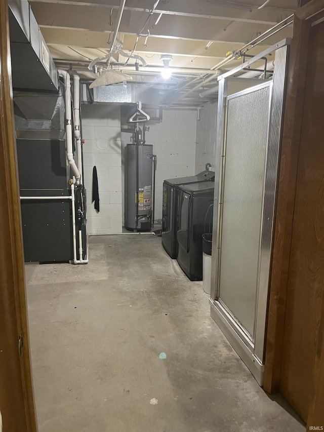 840 Giesler Rd, Jasper, IN 47546 - unfinished basement featuring gas water heater, washer and dryer, and concrete block wall