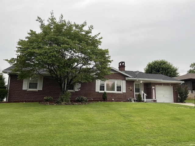 840 Giesler Rd, Jasper, IN 47546 - ranch-style house with an attached garage, brick siding, and a front lawn
