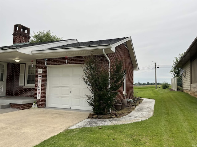 840 Giesler Rd, Jasper, IN 47546 - view of side of home featuring brick siding, driveway, a yard, a garage, and a chimney