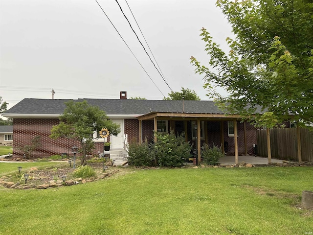 840 Giesler Rd, Jasper, IN 47546 - back of property featuring brick siding, a chimney, and a patio