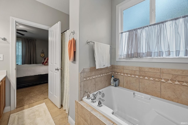 233 Sinclair Dr, West Lafayette, IN 47906 - ensuite bathroom featuring a garden tub, tile patterned flooring, and vanity