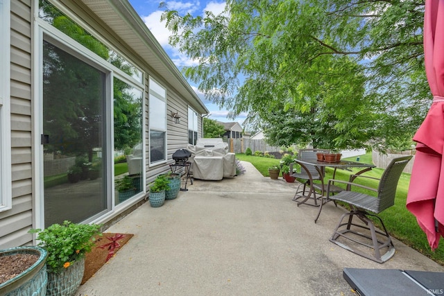 233 Sinclair Dr, West Lafayette, IN 47906 - fenced backyard featuring a patio area and grilling area