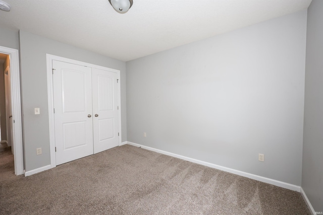 2410 Trillium Cv, Huntertown, IN 46748 - unfurnished bedroom featuring carpet and a closet
