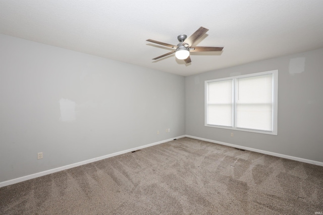 2410 Trillium Cv, Huntertown, IN 46748 - empty room featuring ceiling fan and carpet floors