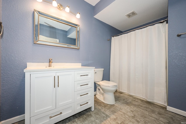 2410 Trillium Cv, Huntertown, IN 46748 - full bathroom featuring vanity, wood finished floors, and curtained shower