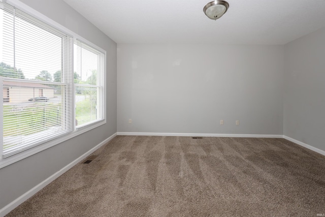 2410 Trillium Cv, Huntertown, IN 46748 - empty room with carpet flooring and baseboards
