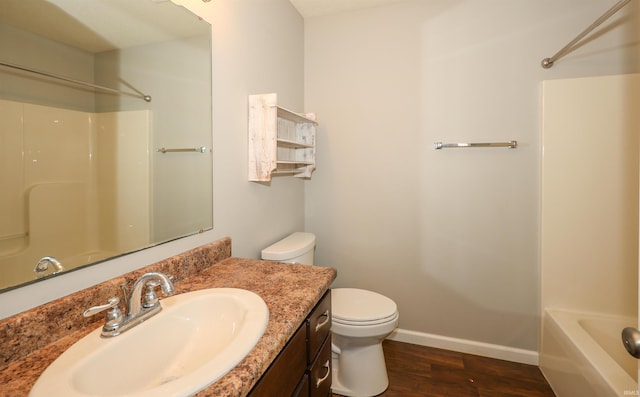 2410 Trillium Cv, Huntertown, IN 46748 - full bathroom featuring vanity, wood finished floors, and shower / bath combination