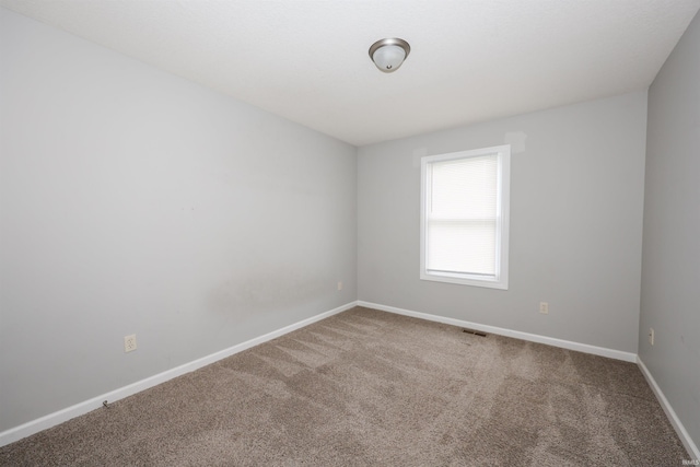 2410 Trillium Cv, Huntertown, IN 46748 - spare room with carpet flooring and baseboards