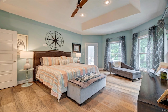 5007 W Michael Ln, Bloomington, IN 47404 - bedroom with recessed lighting, a raised ceiling, light wood-style flooring, and ceiling fan