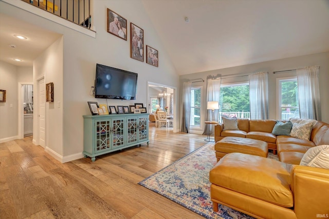 5007 W Michael Ln, Bloomington, IN 47404 - living area with high vaulted ceiling, light wood-style floors, and recessed lighting