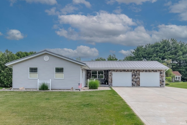 906 N Townline Rd, Lagrange, IN 46761 - ranch-style home with a garage, concrete driveway, a front lawn, and a metal roof