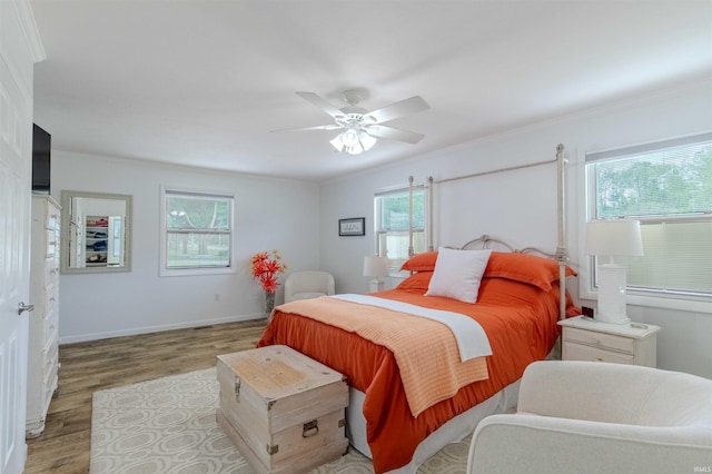 906 N Townline Rd, Lagrange, IN 46761 - bedroom with light wood-style flooring, crown molding, and ceiling fan